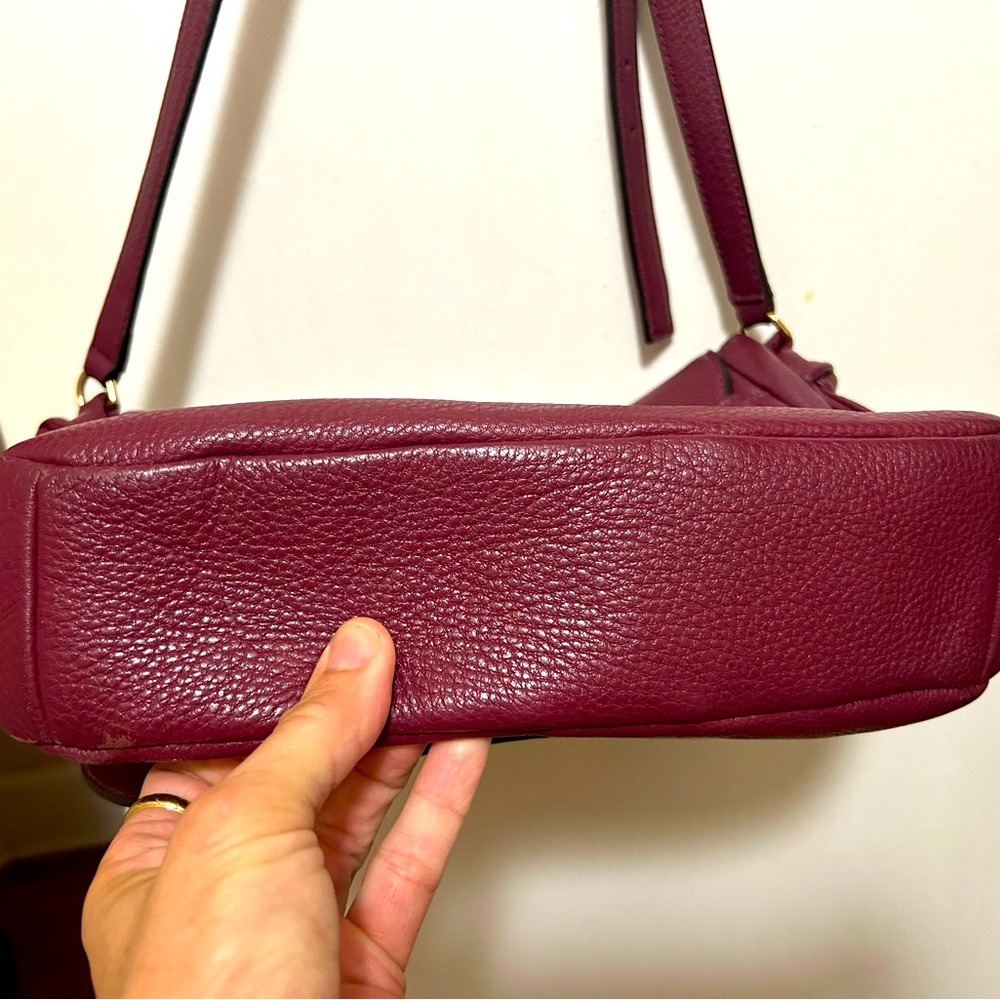 A beautiful burgundy/maroon Tory Burch cross body purse. - Picture 6 of 7